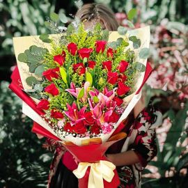 6 Pink Lilies & 25 Red Roses Hand Bouquet