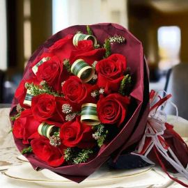 12 Red Roses With Dark Red Paper Wrapper Hand Bouquet