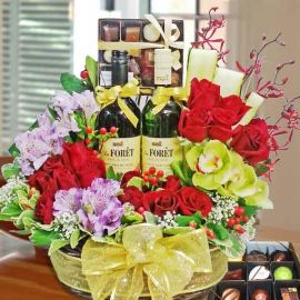 Wines, Chocolates & Red Roses Basket Arrangement